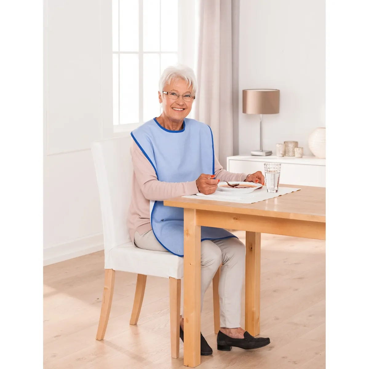 Die moderne Hausfrau Essschürze mit Druckknopf