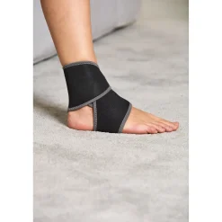 Die moderne Hausfrau Fußbandage